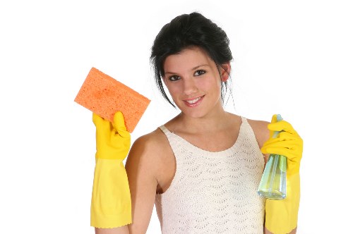 Technician preparing carpet cleaning equipment safely
